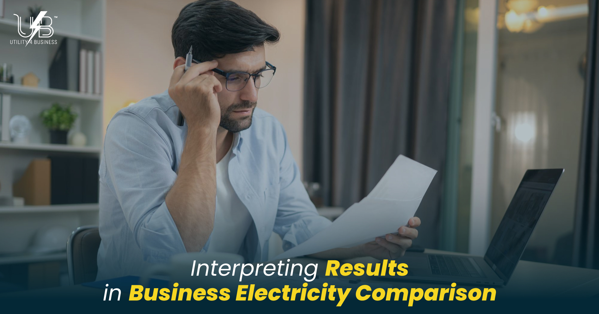 Businessman analyzing documents and laptop while interpreting results in business electricity comparison.